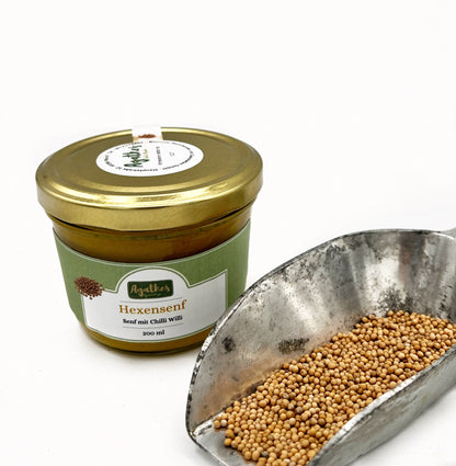 Senf im 200 ml Glas mit Senfkörnern als Dekoration
